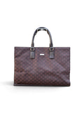 Bolso tote de Gucci en lona GG marrón, un clásico funcional con el desgaste propio del uso.