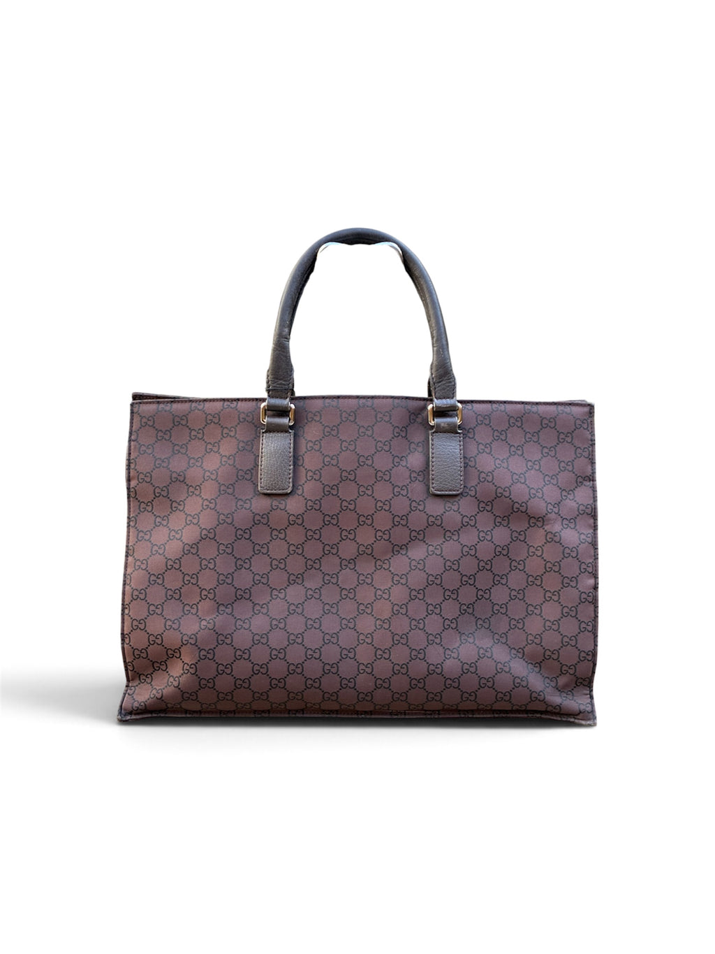 Bolso tote de Gucci en lona GG marrón, un clásico funcional con el desgaste propio del uso.