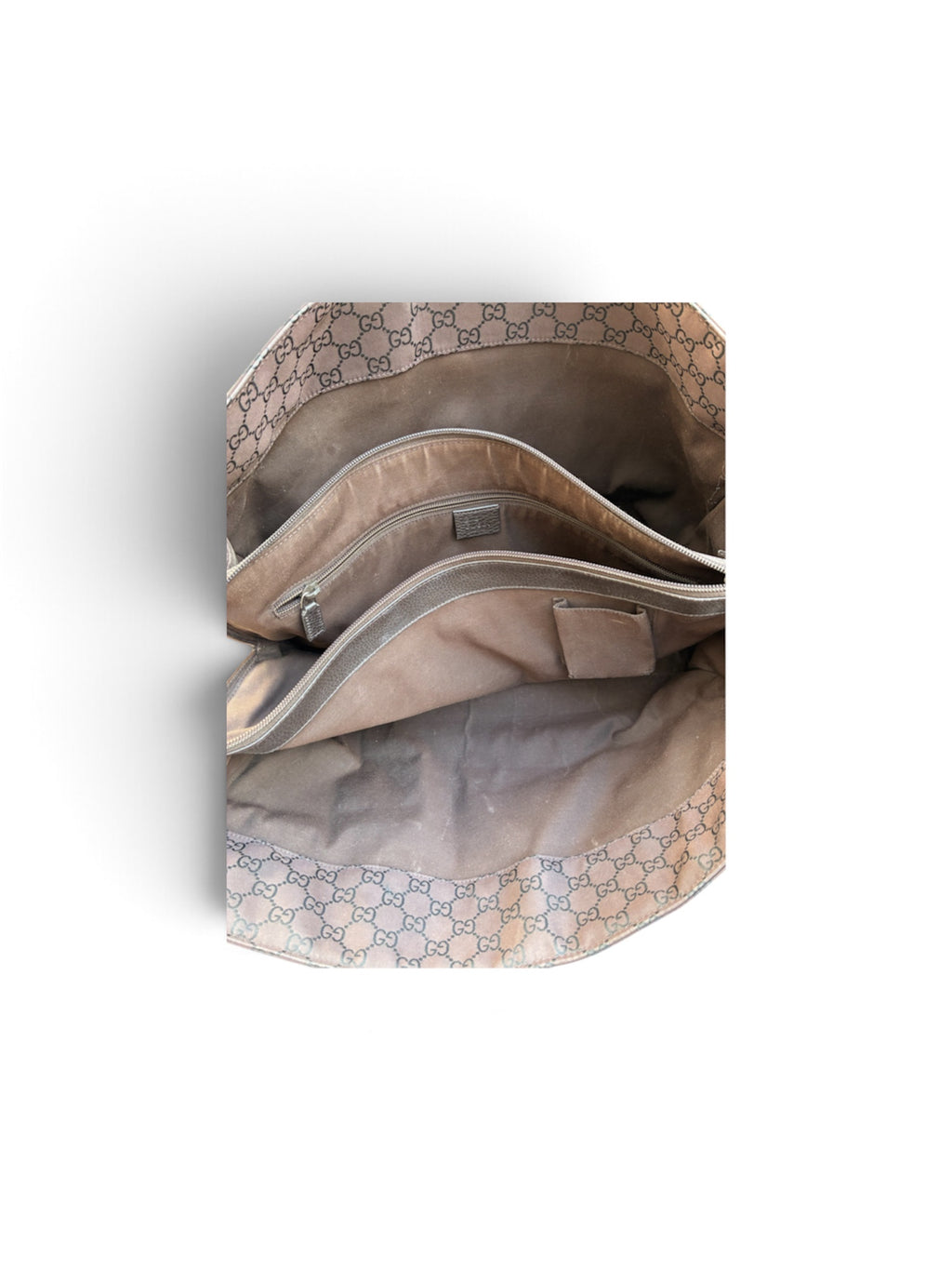 Bolso tote de Gucci en lona GG marrón, un clásico funcional con el desgaste propio del uso.